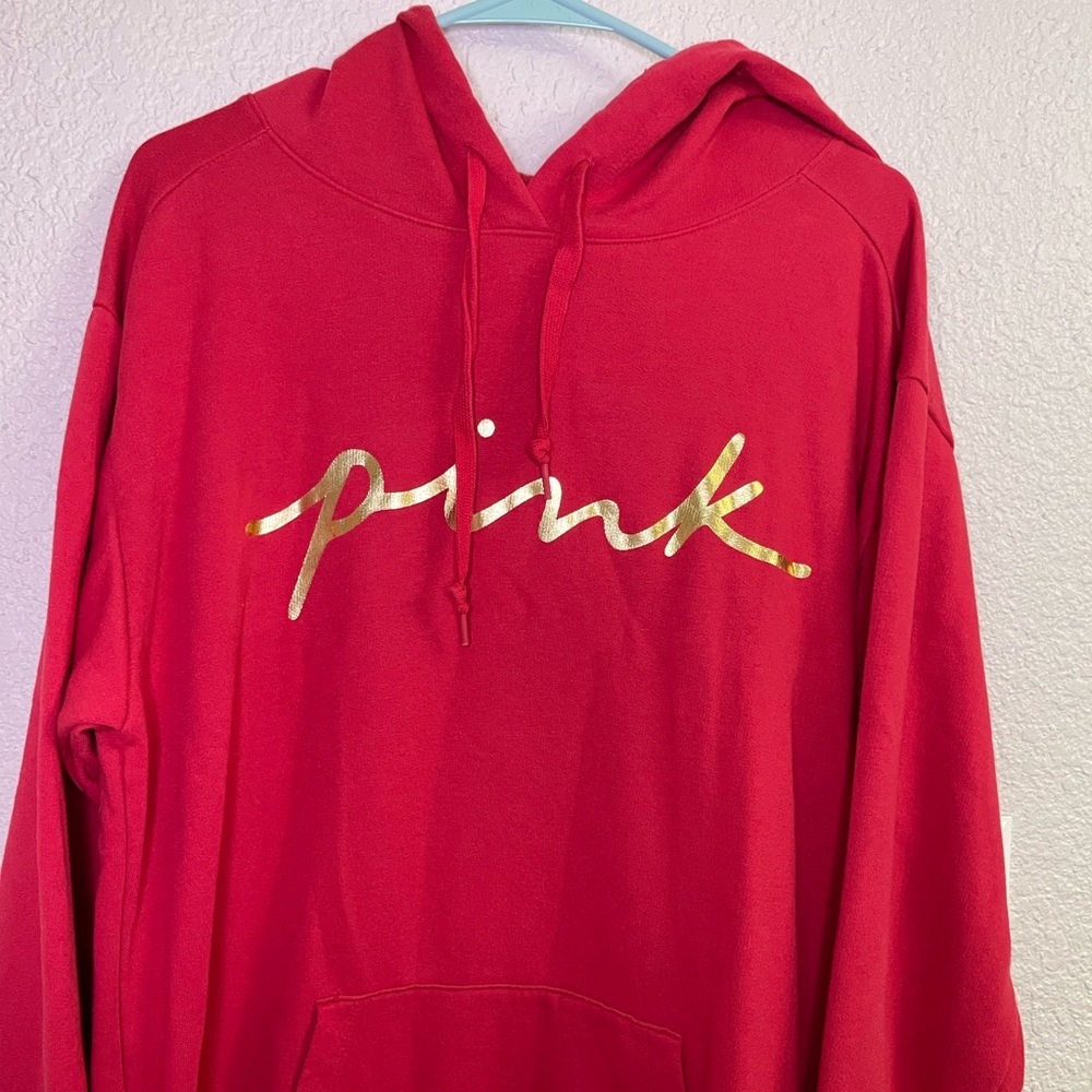 Red Victoria’s Secret hooded sweatshirt. Size Large